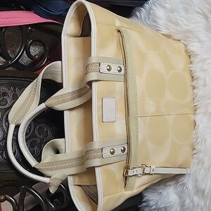 #21. Yellow coach bag